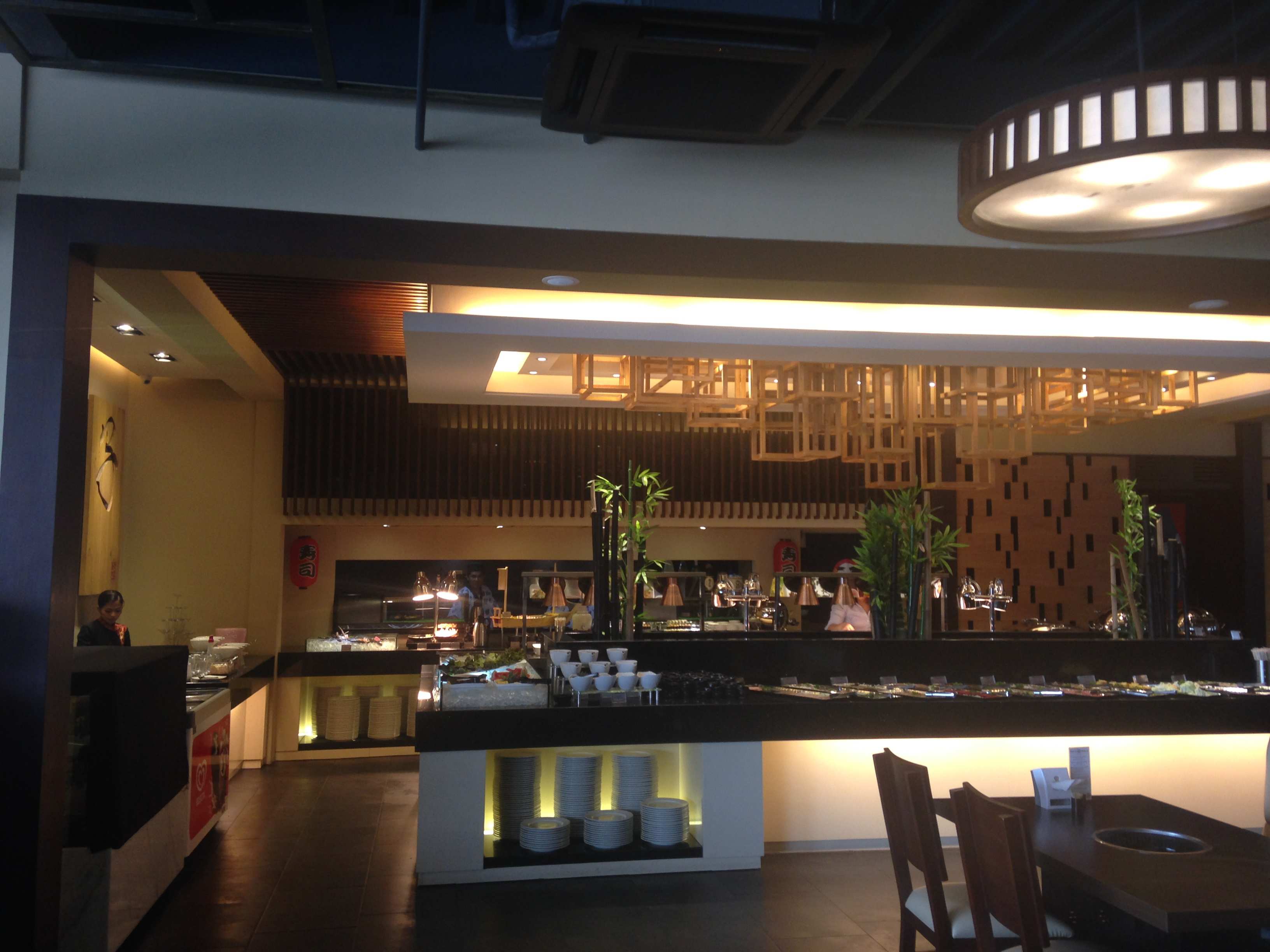 the buffet table at the middle of the restaurant